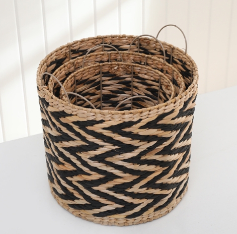 hand woven natural and black rush and paper storage basket with metal frame