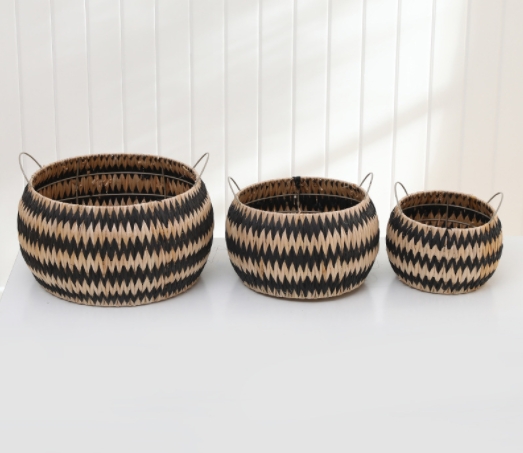 hand woven natural and black rush and paper storage basket with metal frame